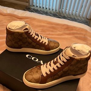 High top coach sneakers khaki color size 6.5 they do run 1 size big